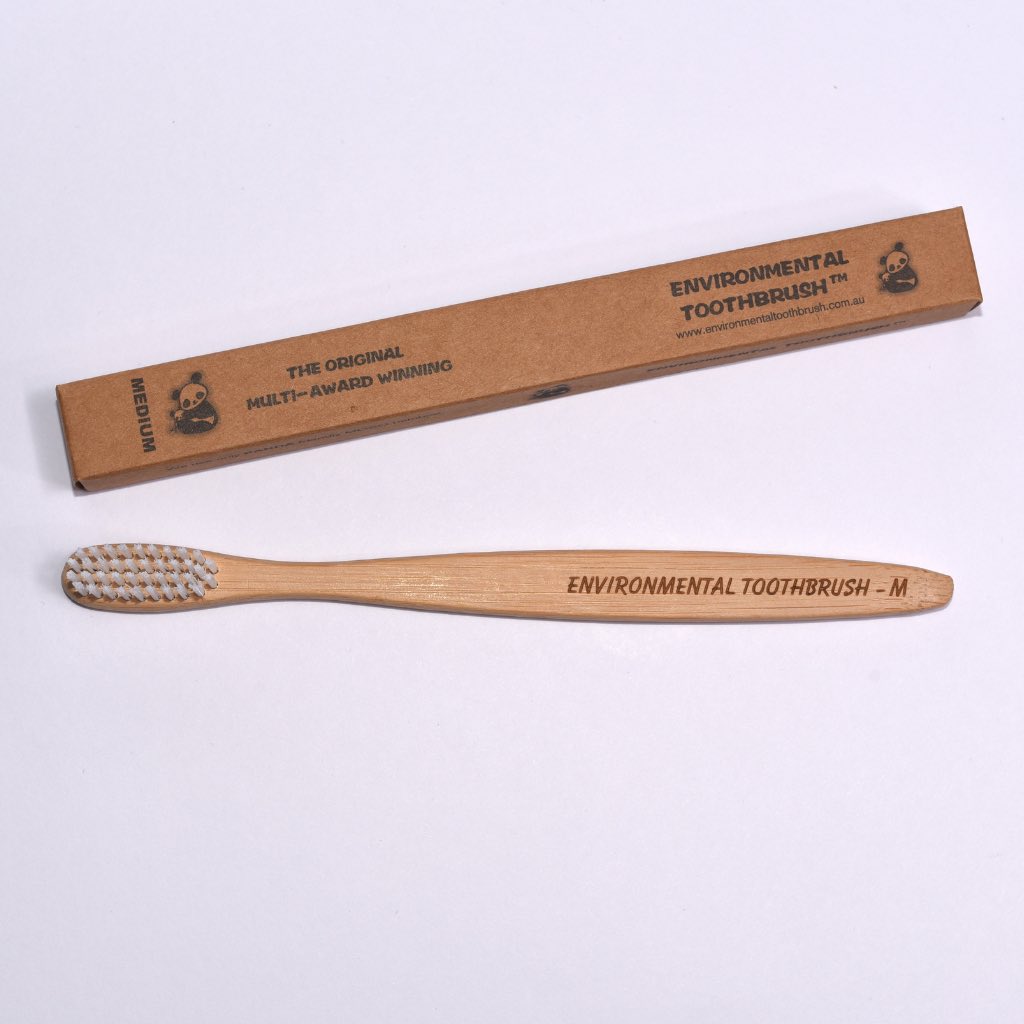 Bamboo toothbrush with packaging for adults
